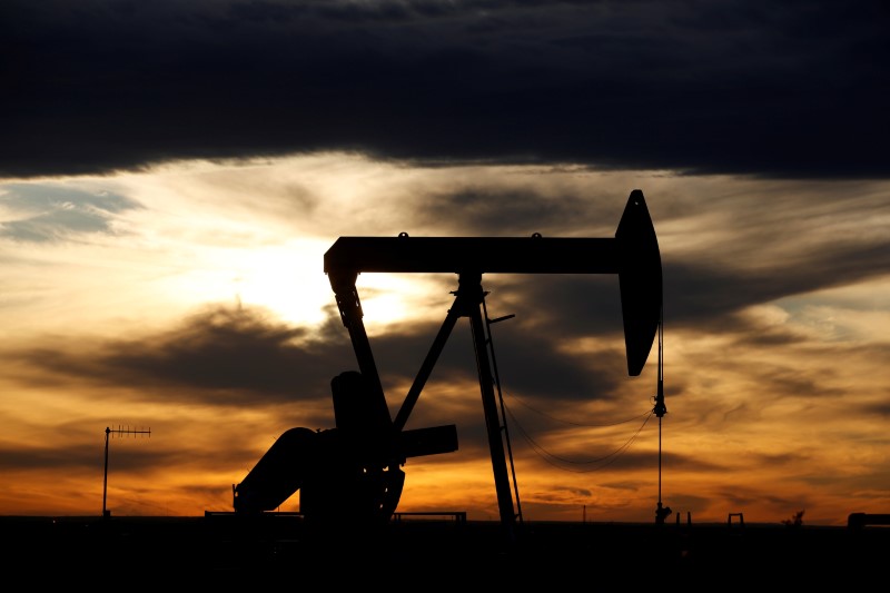 Oil skids after Saudi price cuts, demand optimism fades
