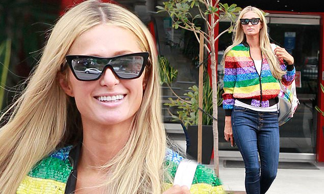 Paris Hilton embraces 2000s glamour as she rocks a rainbow jacket during Beverly Hills shopping trip