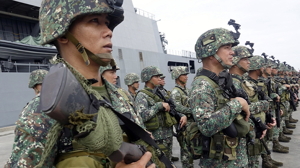 Philippine troops kill Abu Sayyaf leader, rescue hostages