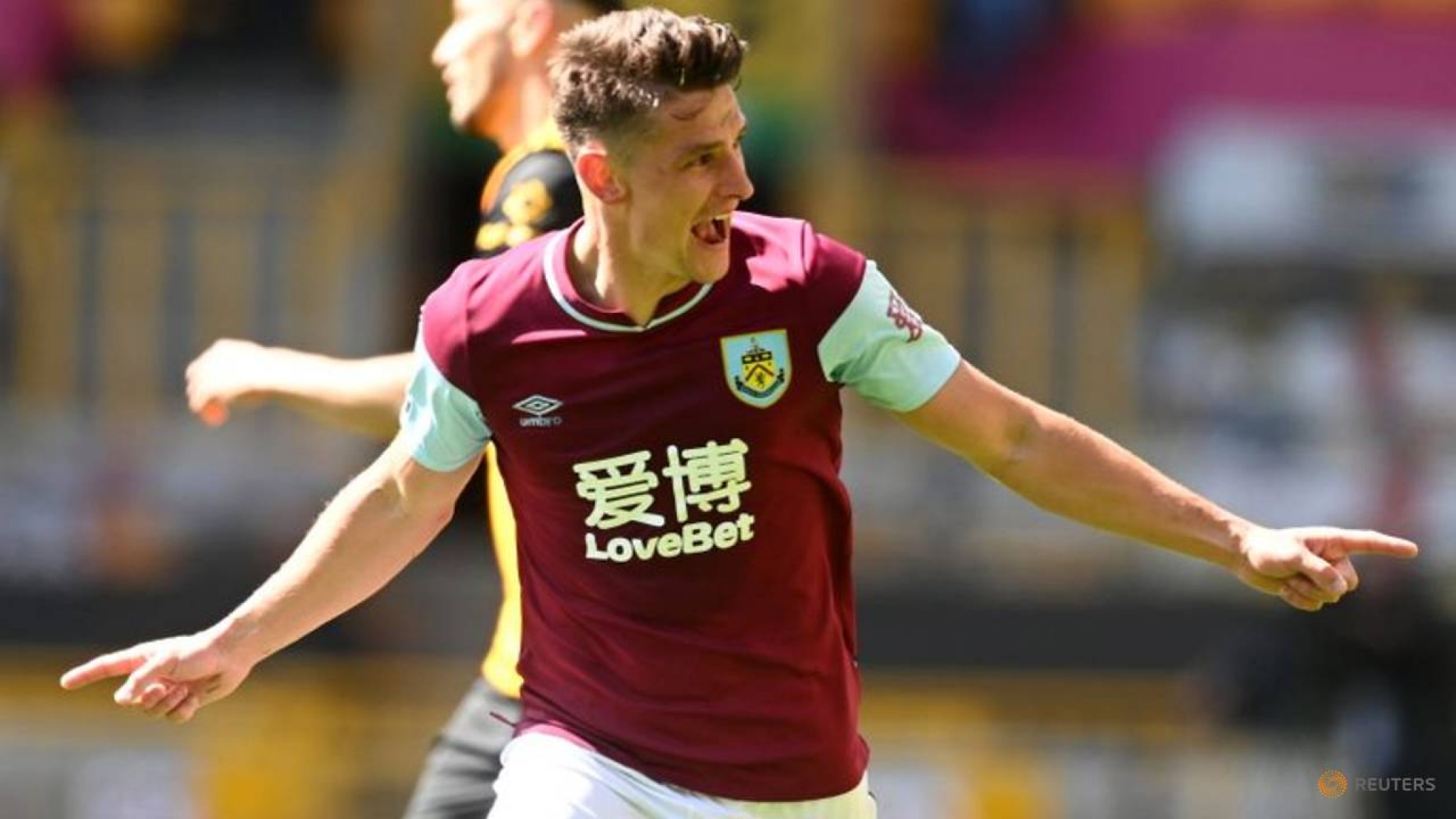 Soccer-Wood hat-trick leads Burnley rout of Wolves