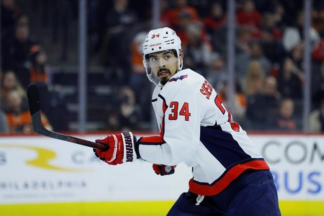 FILE - Washington Capitals' Jonas Siegenthaler plays during an NHL hockey game against the Philadelphia Flyers in Philadelphia, in this Wednesday, Jan. 8, 2020, file photo. The New Jersey Devils acquired defenseman Jonas Siegenthaler on Sunday, April 11, 2021, from the Washington Capitals for a 2021 third-round pick. (AP Photo/Matt Slocum, File)