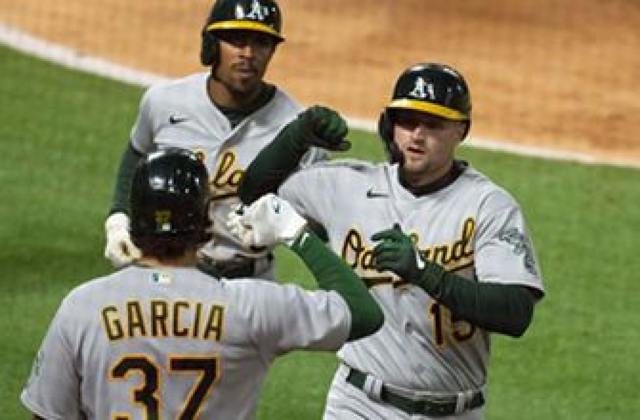 Athletics ride three late homers to 6-2 win over Angels