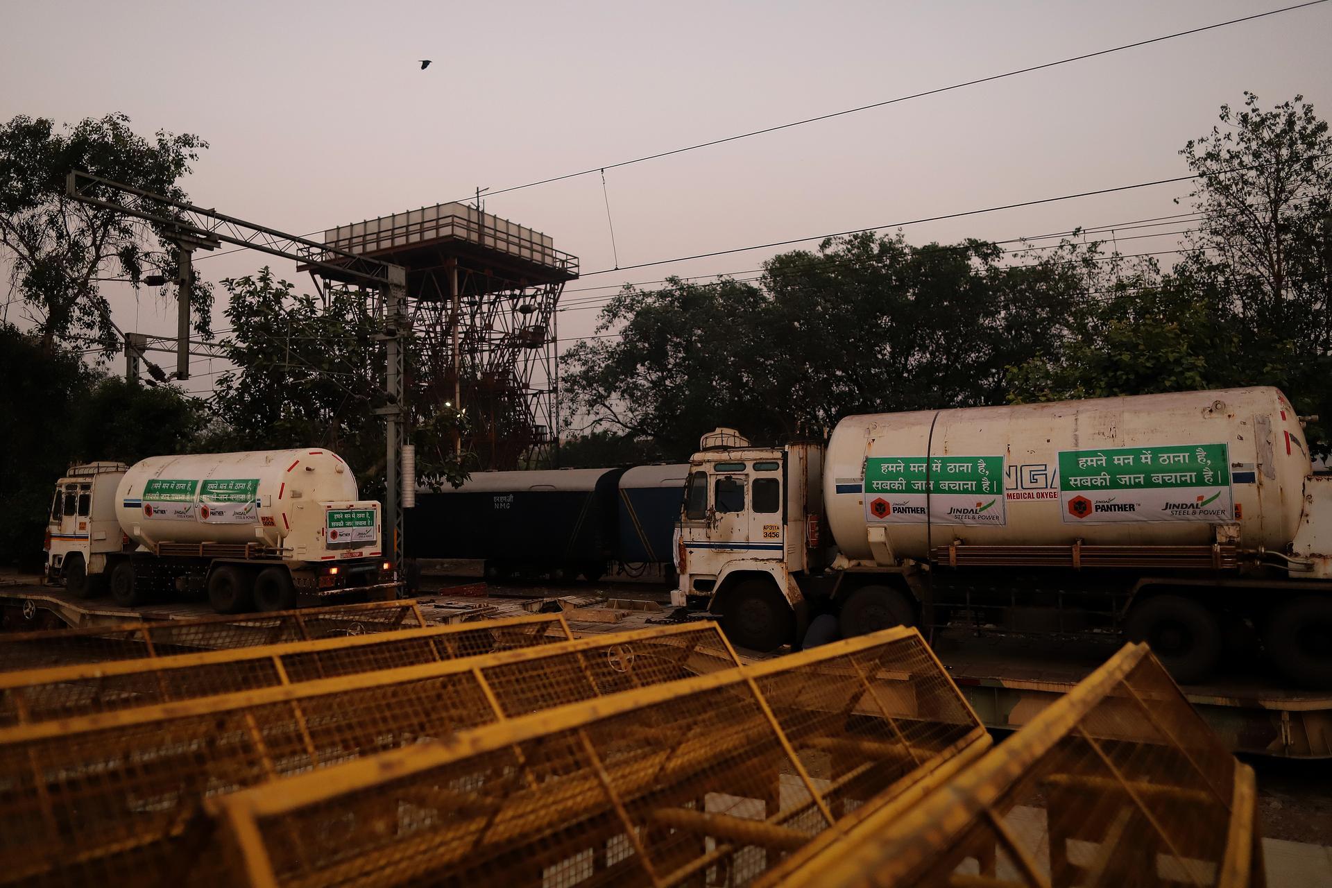 Medical oxygen tankers are delivered via the ‘Oxygen Express’ train to a Delhi railway station. Bloomberg