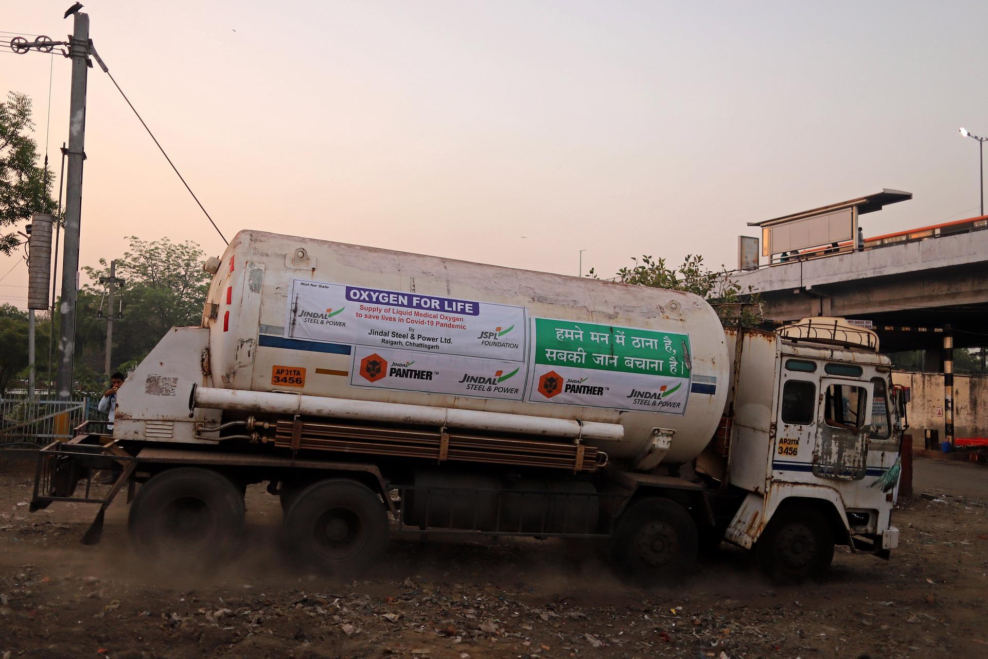 A tanker arrives in Delhi after being transported by rail. Bloomberg