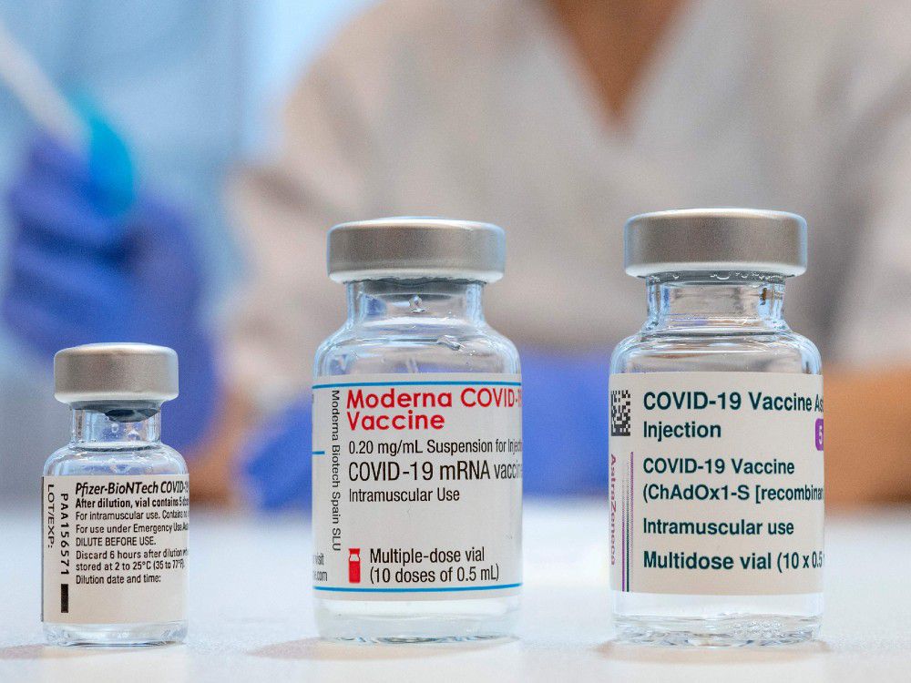 Used vaccine vials that contained (L-R) Pfizer-BioNTech, Moderna and AstraZeneca Covid-19 vaccines are pictured at the Skane University Hospital vaccination centre in Malmo, Sweden, on February 17, 2021.