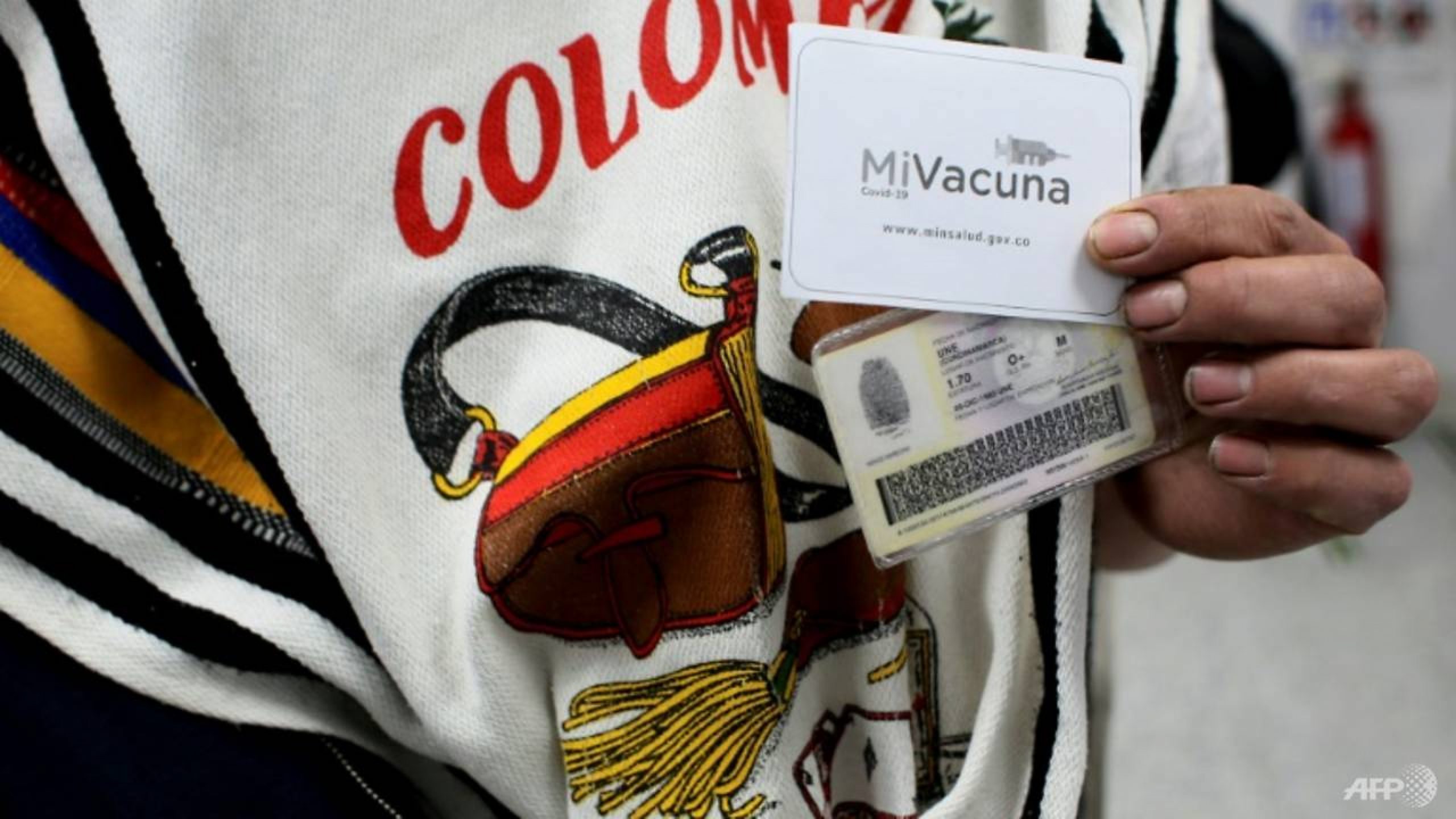 Colombia town orders vaccine refusers to stay home or face fines, jail