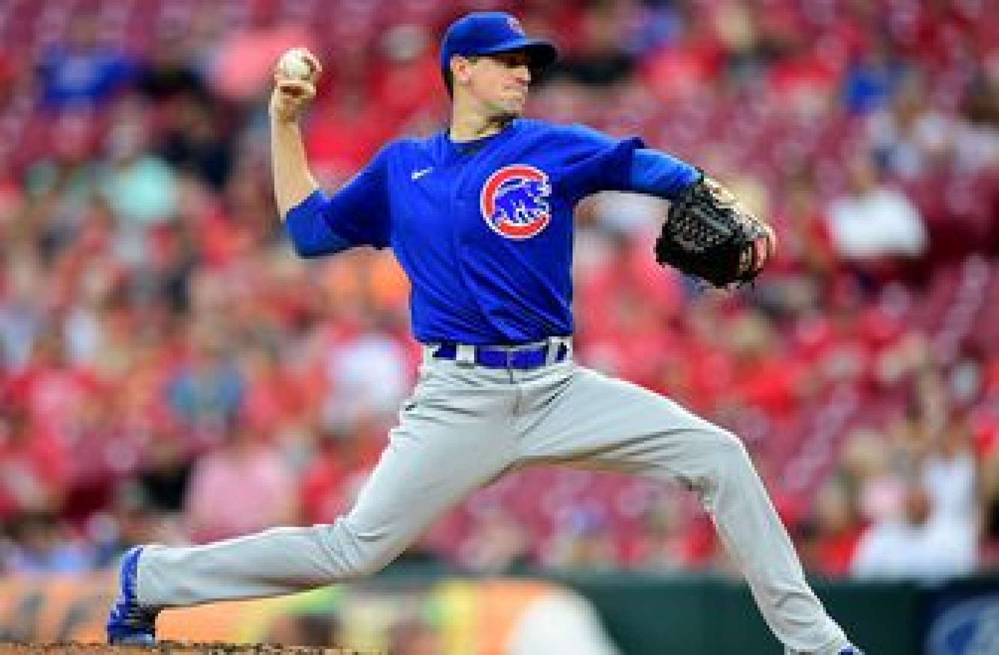 Kyle Hendricks earns league-leading 14th win as Cubs beat Reds, 2-1