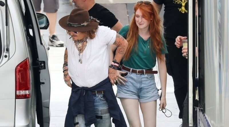 Johnny Depp Continues Music Gigs in Italy, With Cute Red-Head in Tow