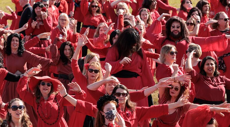 Kate Bush Fans Gather En Masse for Wuthering Heights Day, Dance in Red