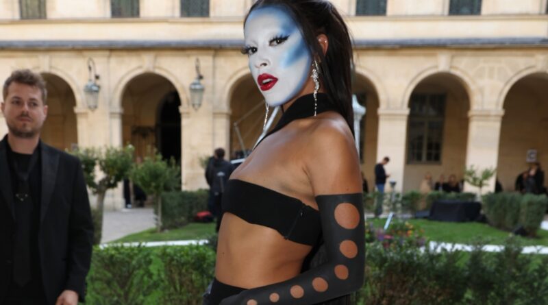Doja Cat Paints Face, Arms for Paris Fashion Week