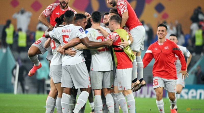 Switzerland edge Serbia in goalfest to reach last 16