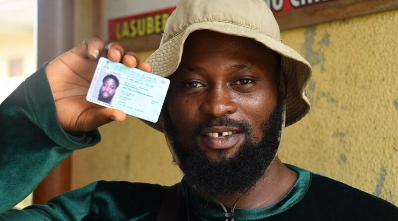 Nigeria’s first-time voters flock to get voting cards ahead of election