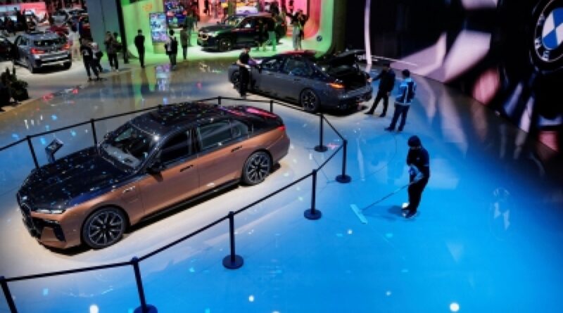 At Shanghai show, auto rivals lure drivers with in-car karaoke, crystal balls