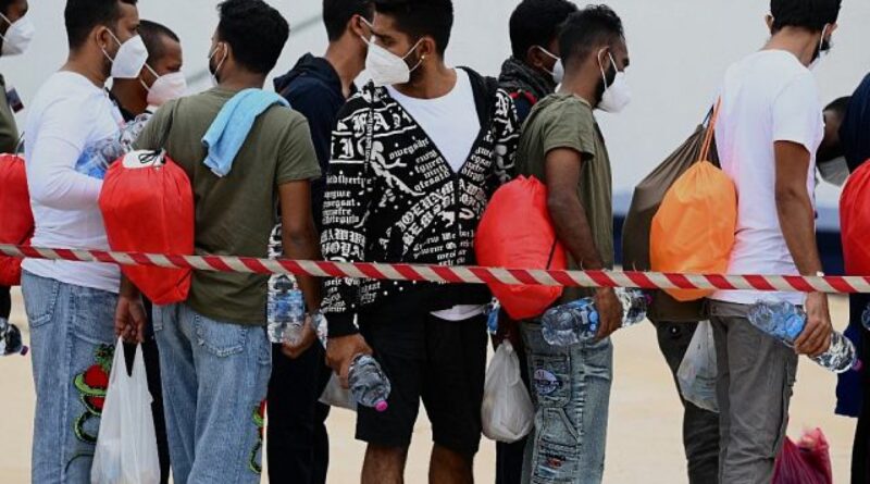 Dozens missing after migrant boat sinks off Italian coast