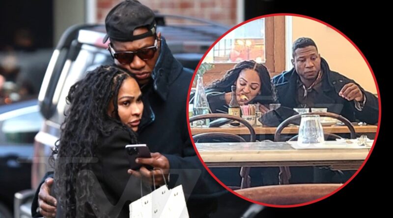 Jonathan Majors Cuddles Girlfriend Meagan Good in NYC Day Before Trial
