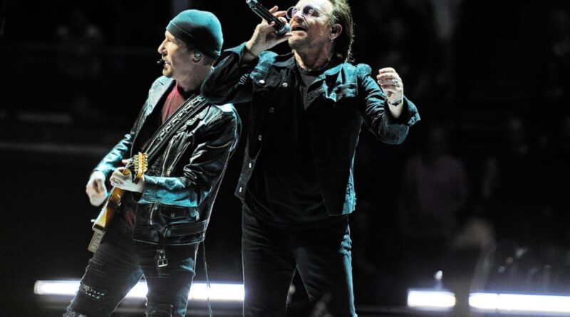 U2 Remembers Pogues’ Shane MacGowan With Moving ‘A Rainy Day in Soho’ Cover