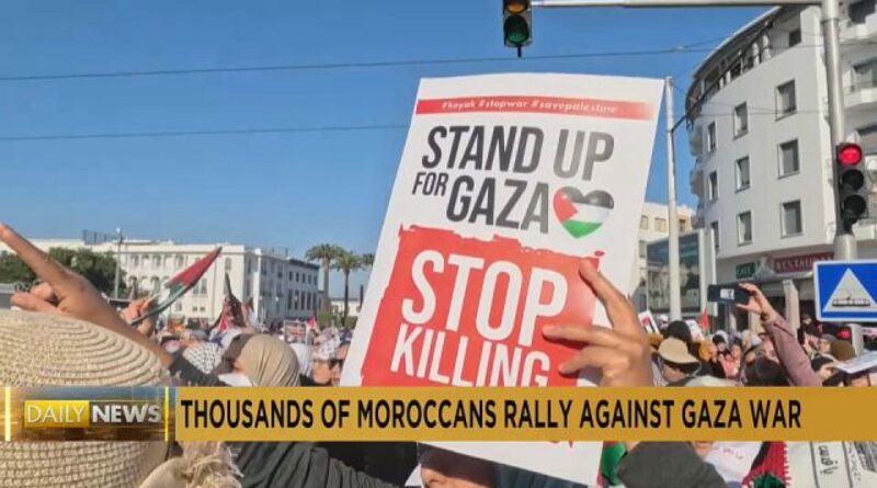 Moroccans wave Palestinian flags at a demonstration in support of Gaza