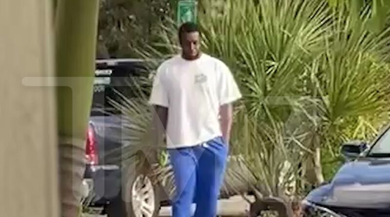 Diddy Seen on Video Pacing Around Miami Airport After Raids at Both Homes