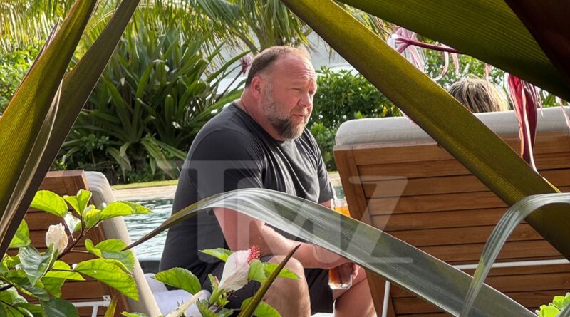 Alex Jones Relaxing in Hawaii, Still Owes Millions to Sandy Hook Families