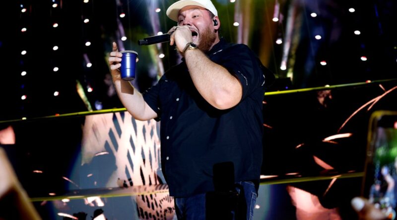 Luke Combs Celebrates Wife & Kids at LA’s SoFi Stadium – And Shotguns a Beer With Luke Wilson & Jimmy Butler Too