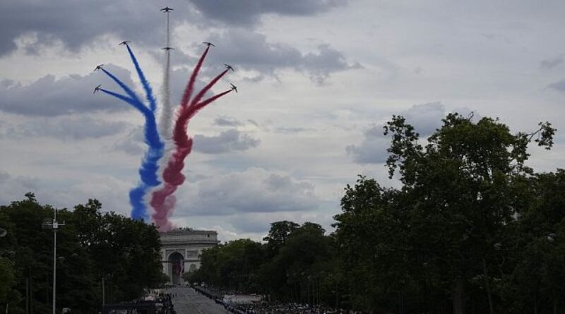 France’s Bastille Day parade meets the Olympic torch relay