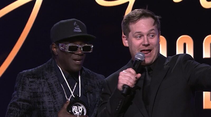 Flavor Flav Spontaneously Auctions Clock Off His Neck for $15,000