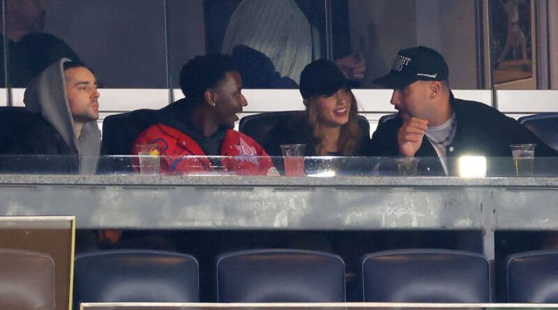 Taylor Swift & Travis Kelce Rock Black Baseball Caps to Game 1 Between the New York Yankees & Cleveland Guardians