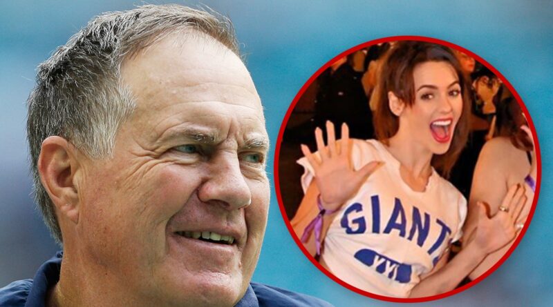 Bill Belichick’s Girlfriend Imitates Him For Halloween, Short Shorts & Giants Tee!