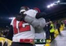 Tom Brady hugs his son after winning the 2021 NFC Championship