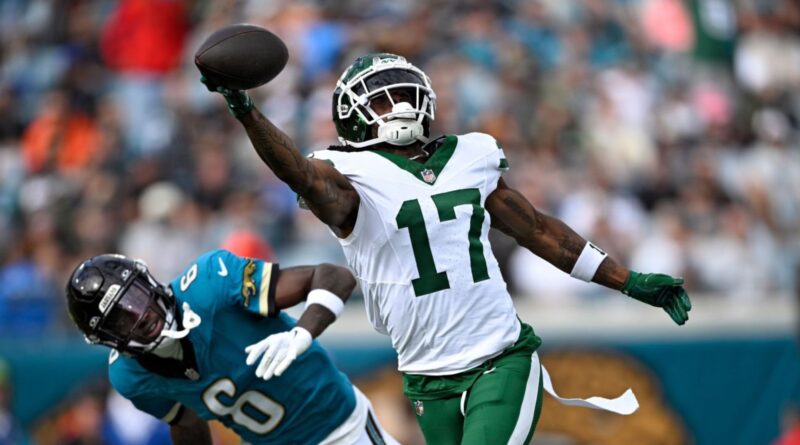 Jets continue overhaul, release star WR Adams