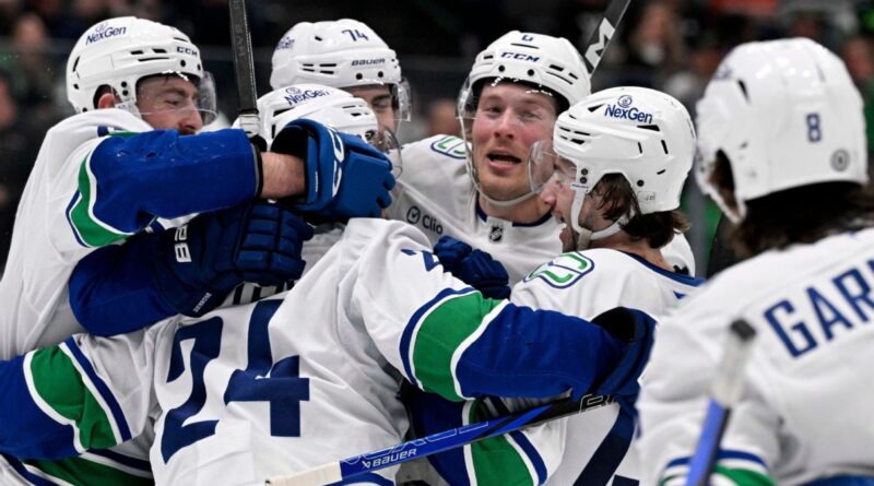 Comeback Canucks make history with furious finish