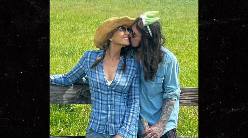 Elizabeth Hurley & Billy Ray Cyrus Seem to Debut New Relationship
