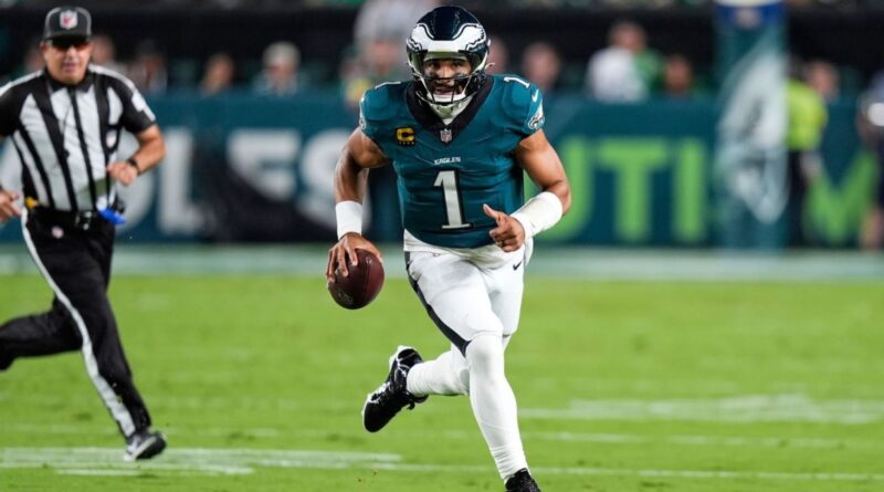 Banner day for Eagles as champs hold off Cowboys in wild one